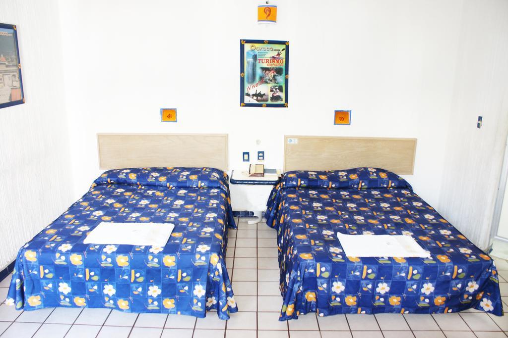 Hotel Plaza Conejo Huatulco Номер фото